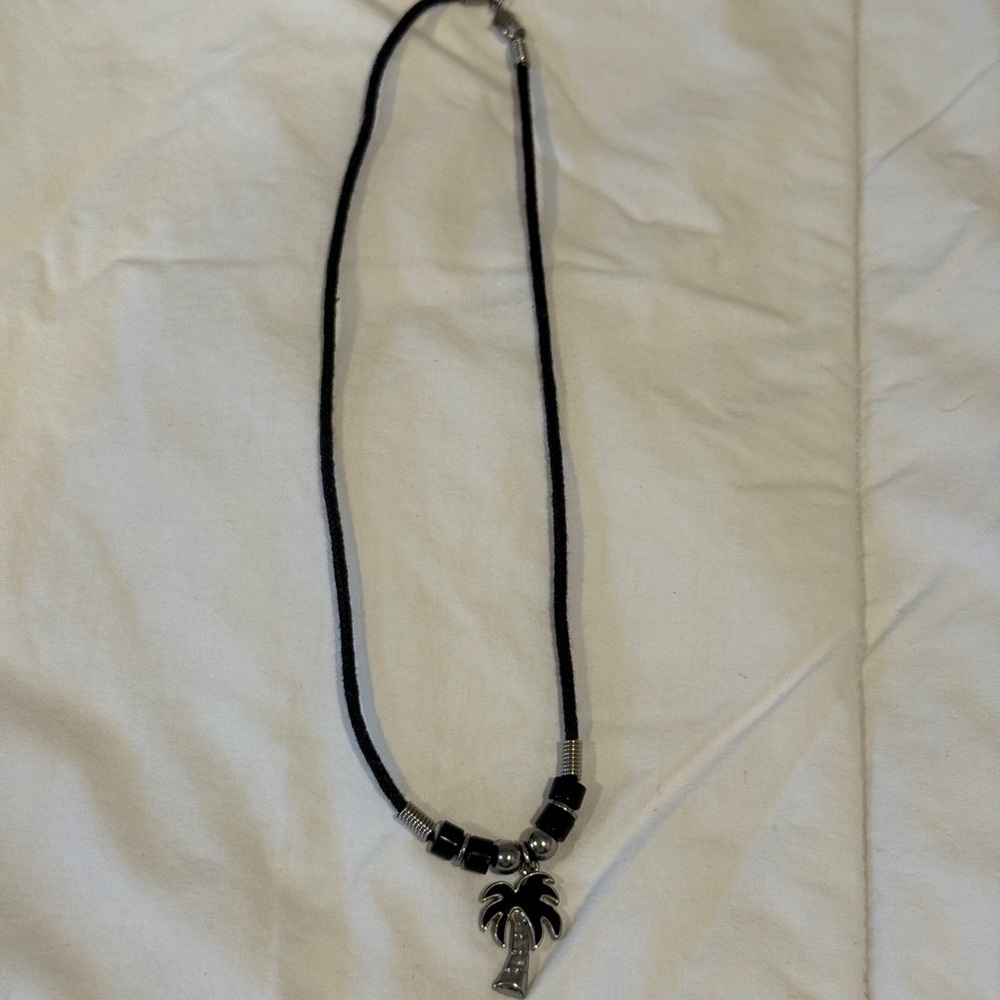 Black cord necklace with silver palm tree charm originally a mood necklace